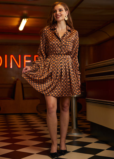 Minifalda plisada con estampado geométrico