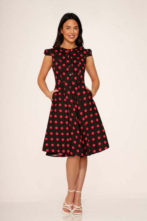 Vestido swing de lunares negros y rosas