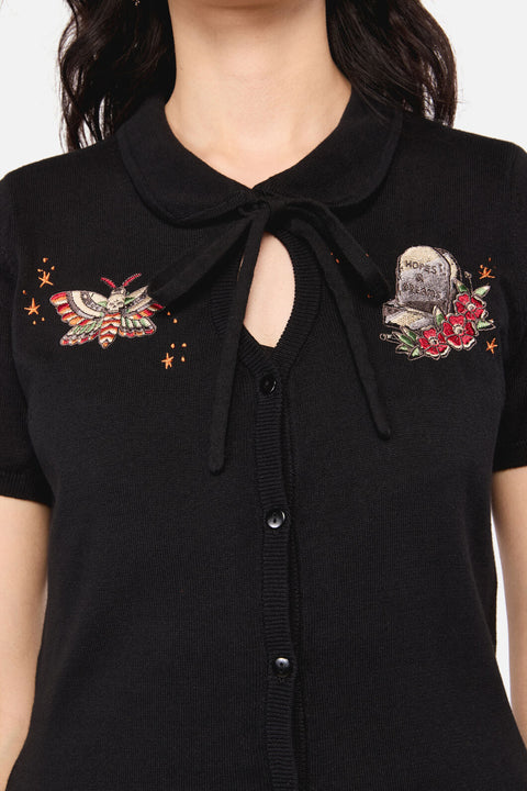 Cárdigan para la colocación de tatuajes en la víspera de Todos los Santos