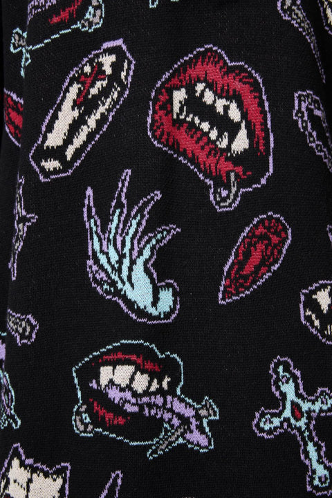 Cárdigan gótico absorbido