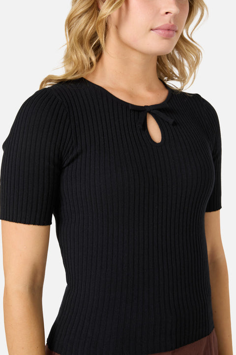 Top de punto con lazo Sara