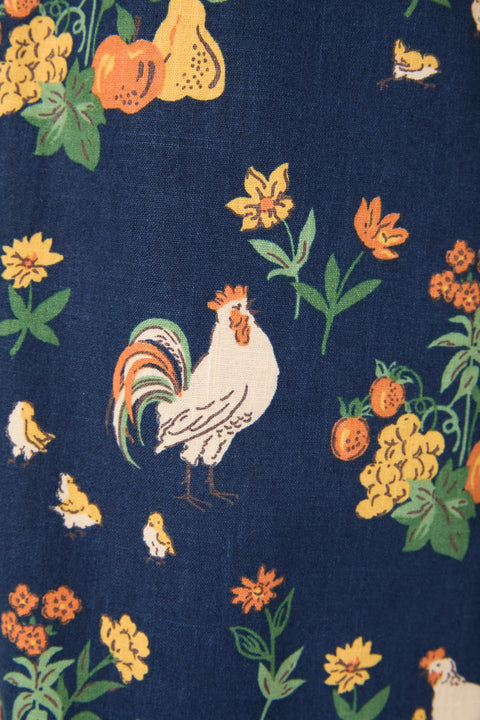 Pantalones de algodón ajustados con estampado de pollos